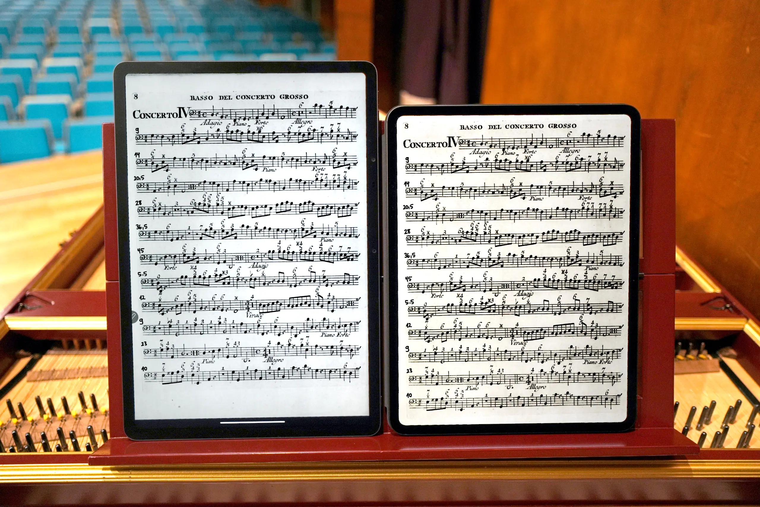 TCL NxtPaper 14 Android Tablet compared to the 13-inch Apple iPad Pro or iPad Air (displaying sheet music)